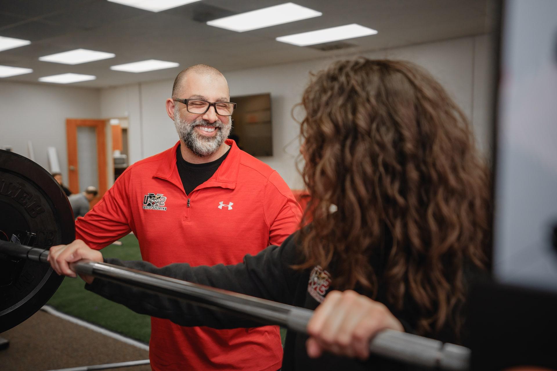 Professor helping student exercise